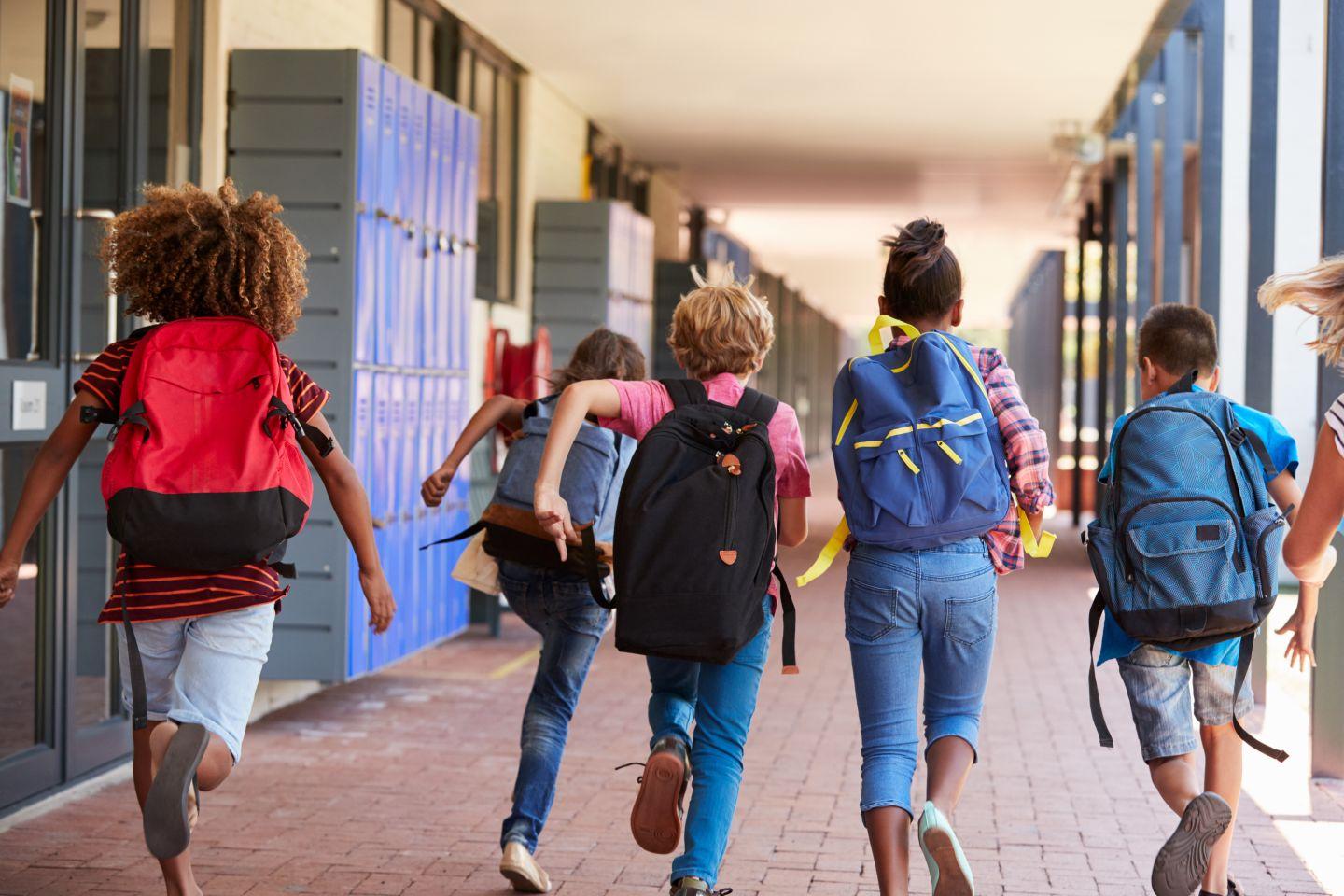 Kids running to school.