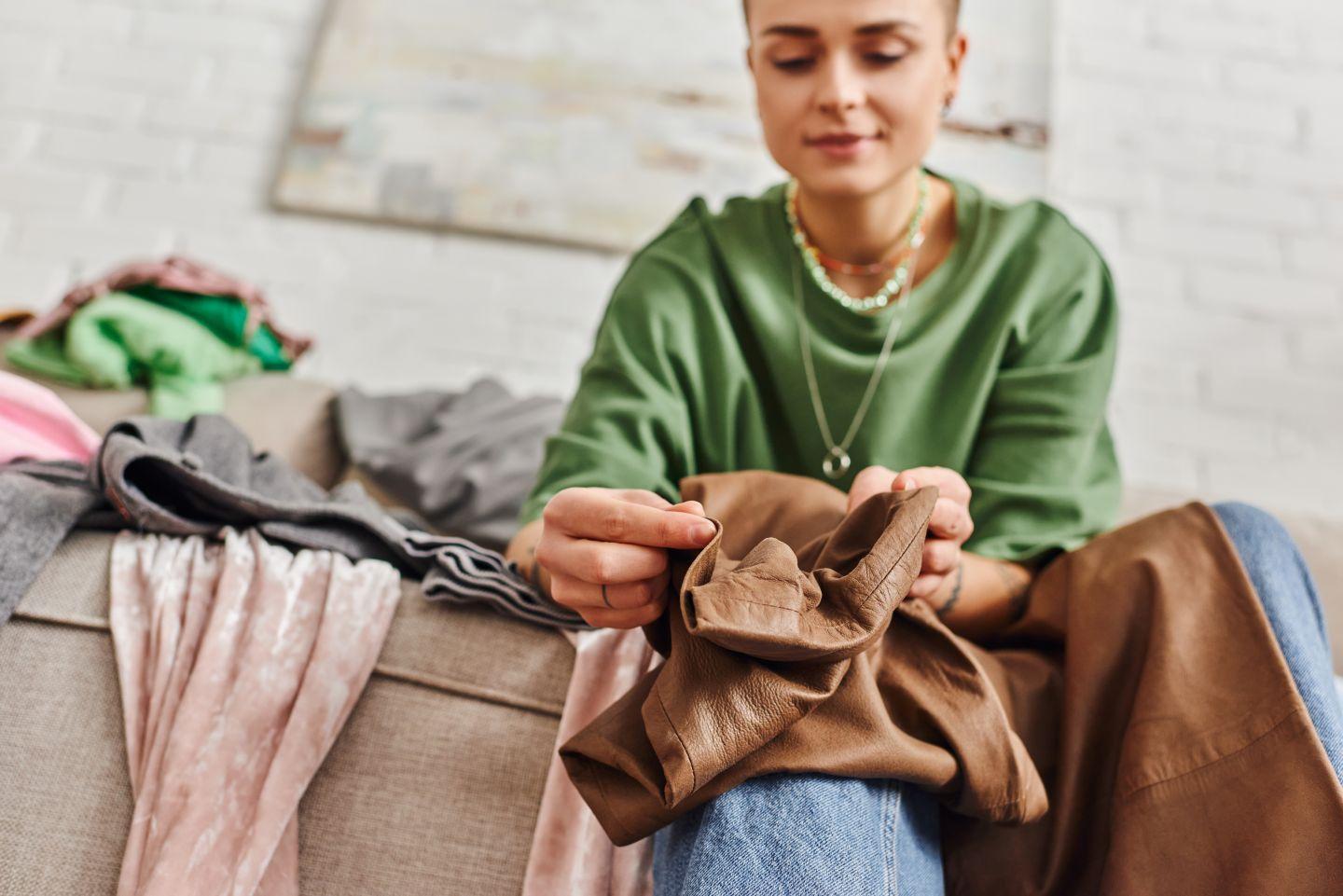 Woman holding clothes