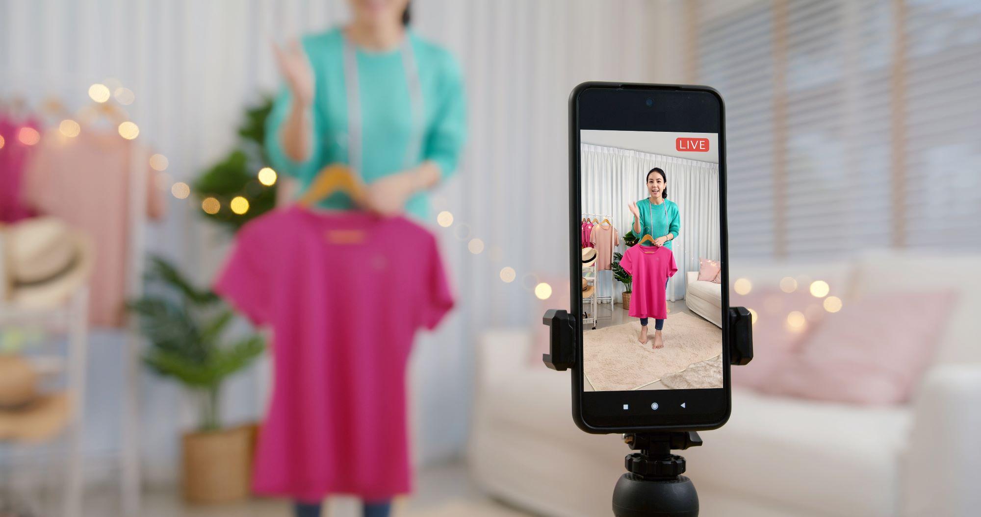 A woman live streaming.