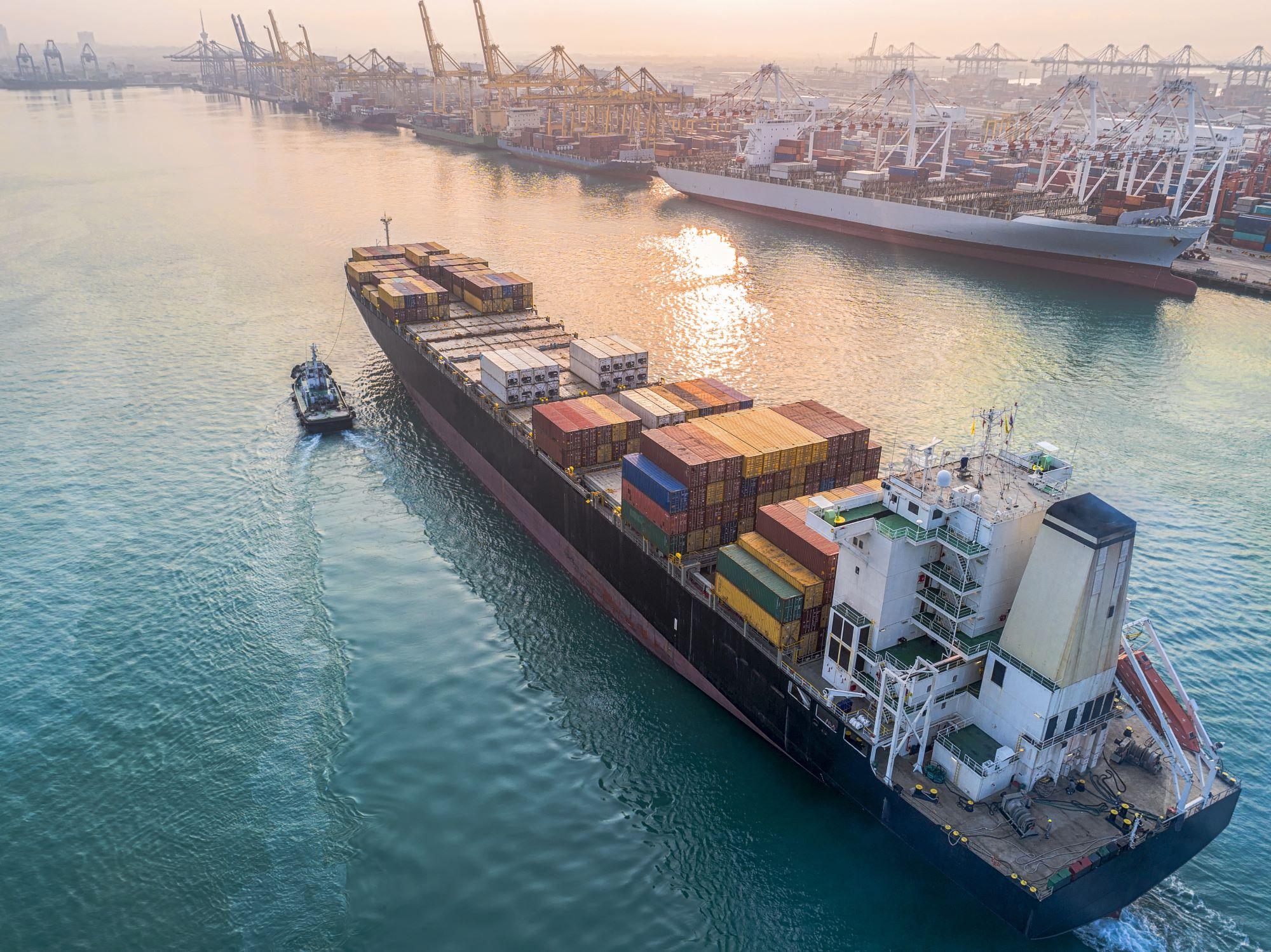 A container ship pulling into port.