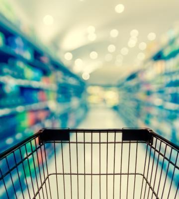 A cart being pushed down an aisle.