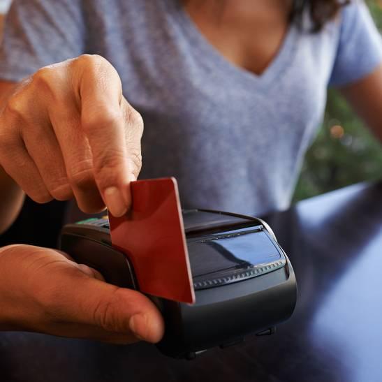 Customer swiping their credit card.