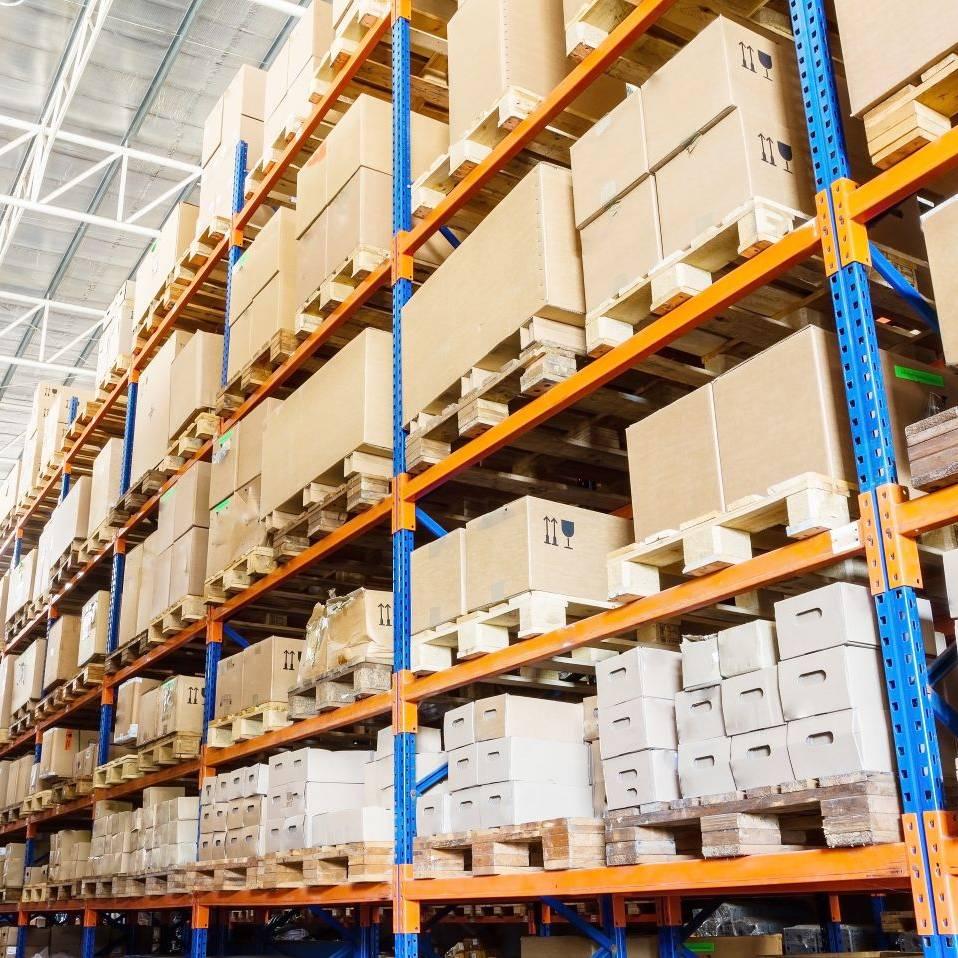 Goods packaged on warehouse shelves.