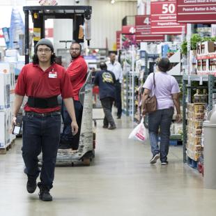 Employees working in warehouse store