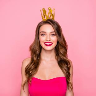 Prom queen wearing a gold crown