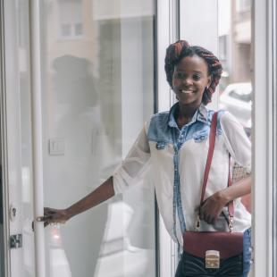 Two women enter a retail shop